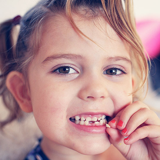 Planning for Your Child's First Loose Tooth | Holt Dental Care - Dentist in West Jordan - Dr. Joshua C. Holt